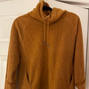 Burnt orange Nike sweatshirt.